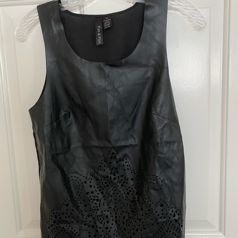 Scoop neck, sleeveless top. Never used. Sz M.